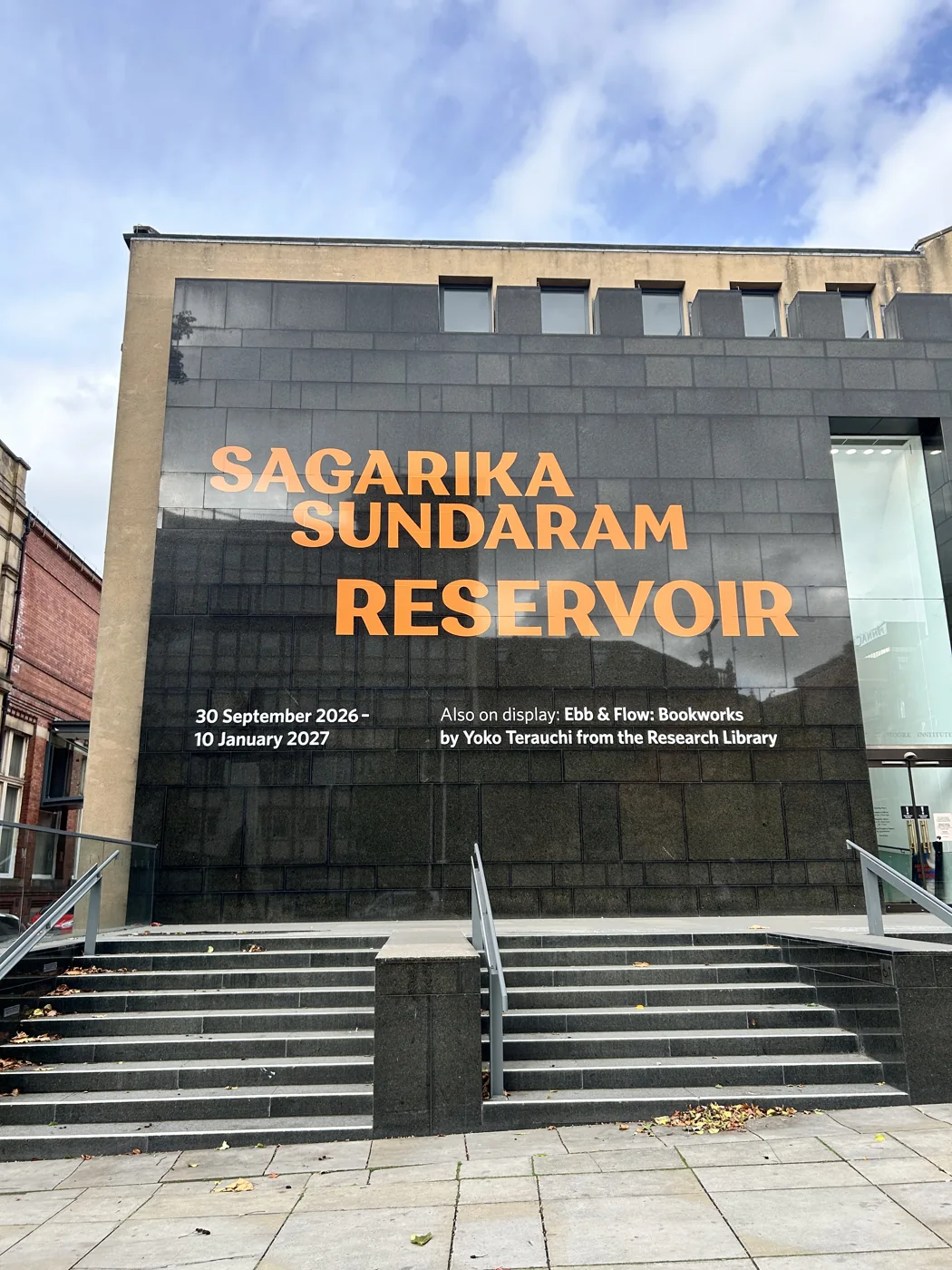 Front view of the Henry Moore Institute showing the scale and placement of the orange exhibition lettering
