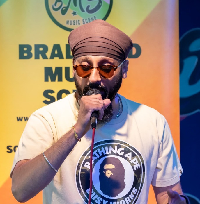 Bradford artist performing on the BMS stage at the Darley St Market takeover