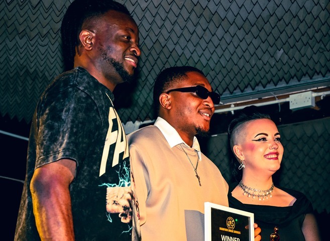 BMS Awards winners holding their trophies